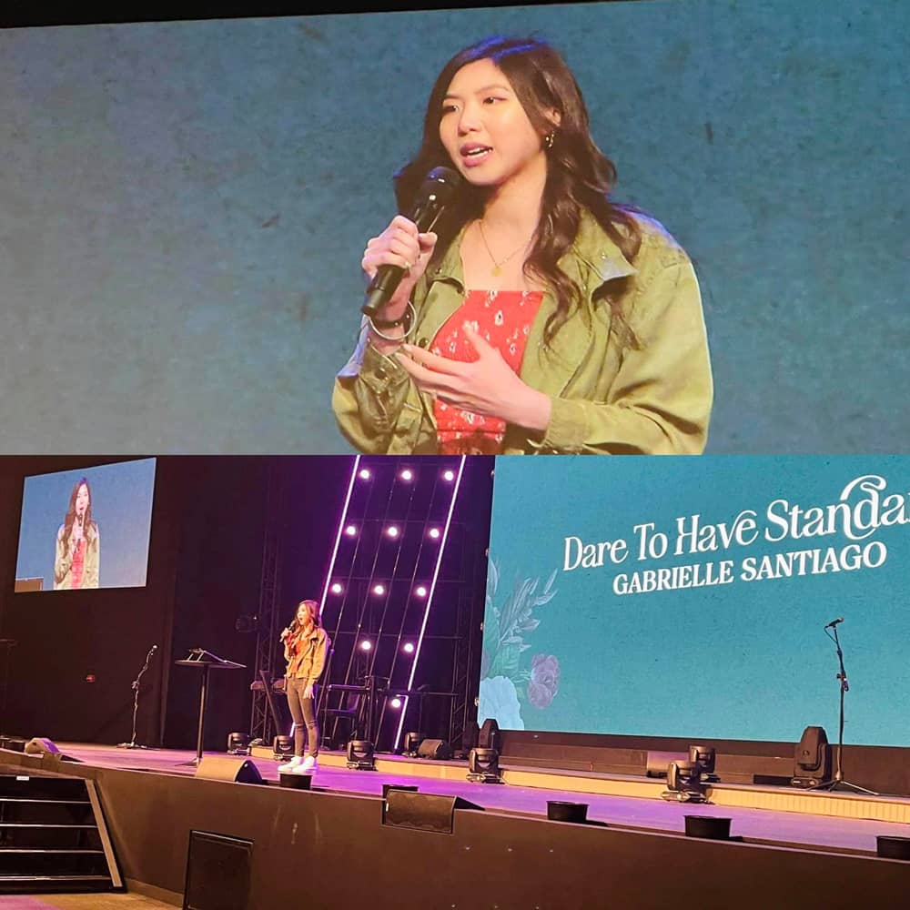 Gaby Santiago speaking at a Women's Conference